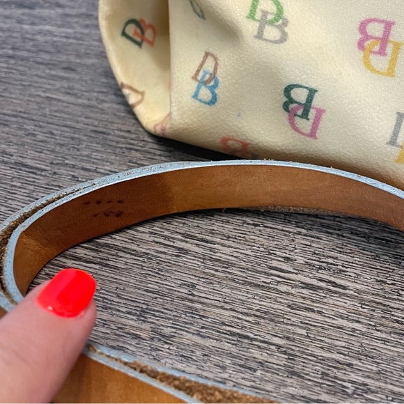 Dooney & Bourke Cream Satchel Bag pre-owned. Strap has stain. - Picture 16 of 16